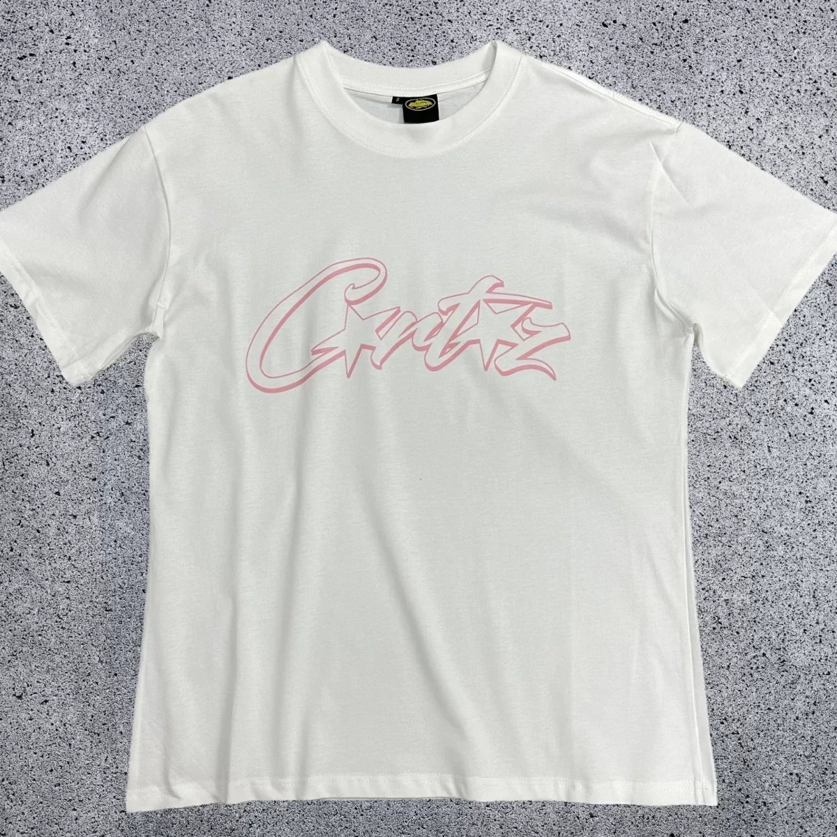 Corteiz Pink Accent Star-Logo Graphic Tee - White & Pink Streetwear T-Shirt